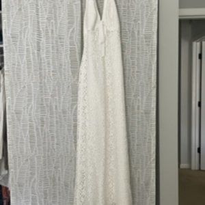 White cotton and lace wedding dress with satin underlay